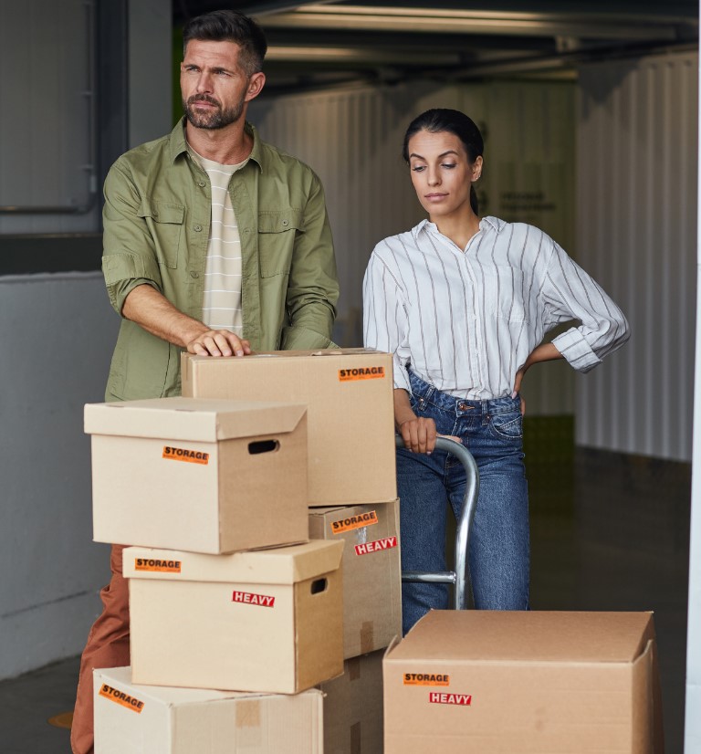 couple with boxes for storage